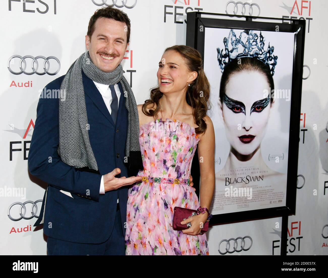 Director Darren Aronofsky (L) and cast member Natalie Portman pose together before a screening of the film "Black Swan" at the closing night of Fest 2010 in Hollywood, California November