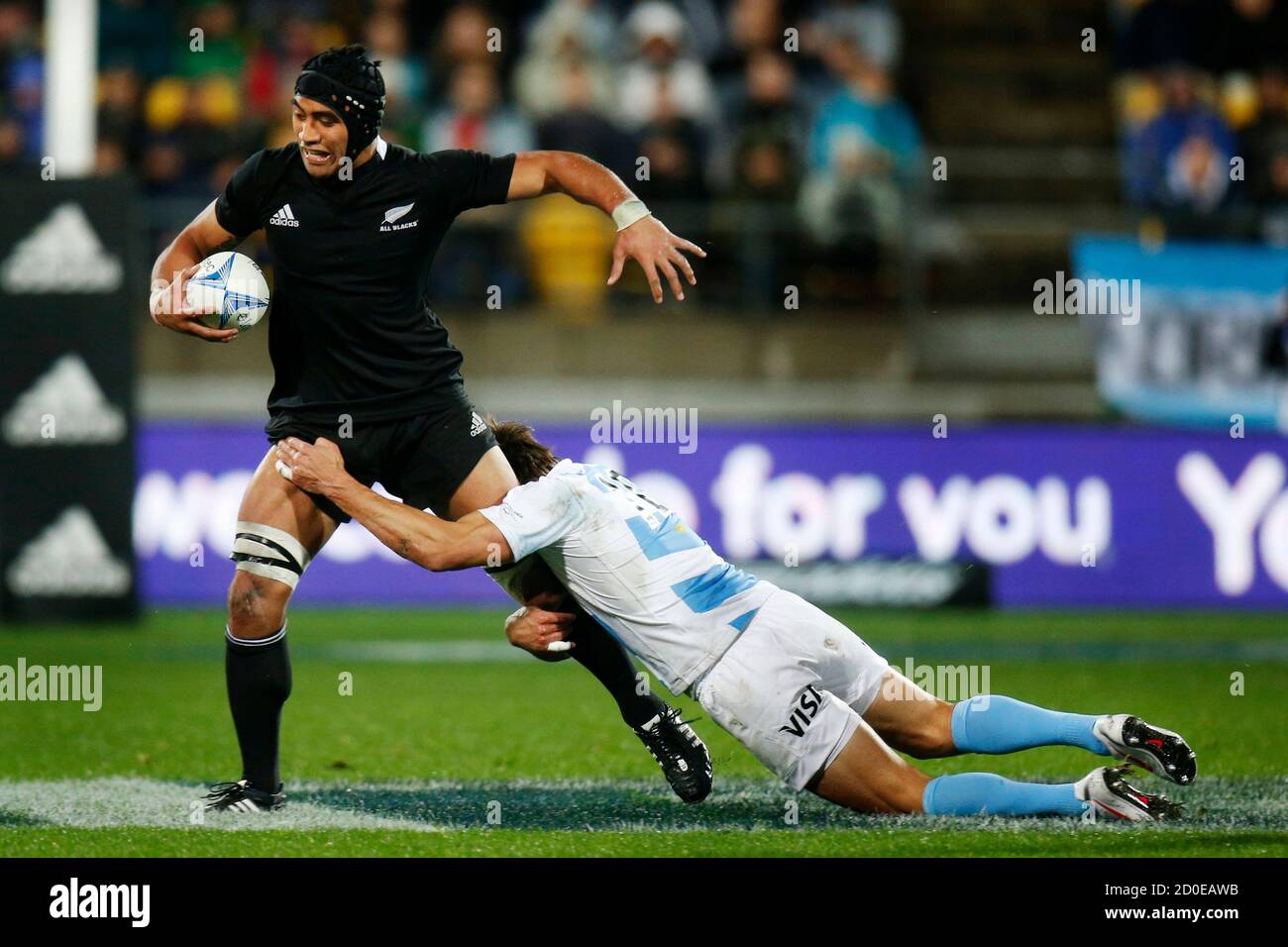 Argentina Pumas' Juan Martin Hernandez (R) tackles New Zealand All Blacks'  Victor Vito during their Rugby Championship test match in Wellington,  September 8, 2012. REUTERS/Anthony Phelps (NEW ZEALAND - Tags: SPORT RUGBY