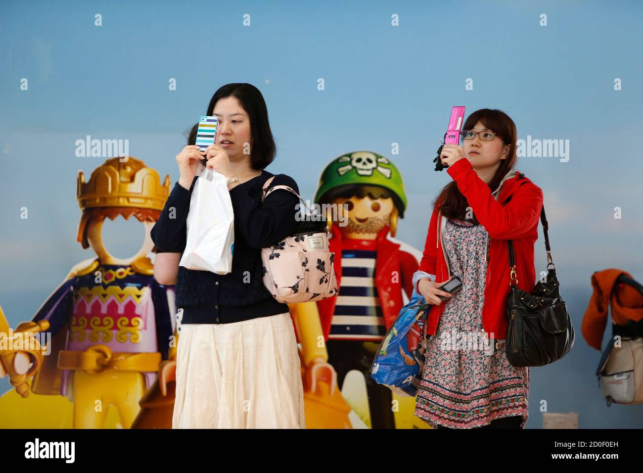 Tourists take photos at the Playmobil FunPark, adjacent to the Playmobil  Malta factory in the Hal Far Industrial Estate outside Valletta April 14,  2014. Playmobil is celebrating its 40th anniversary in 2014