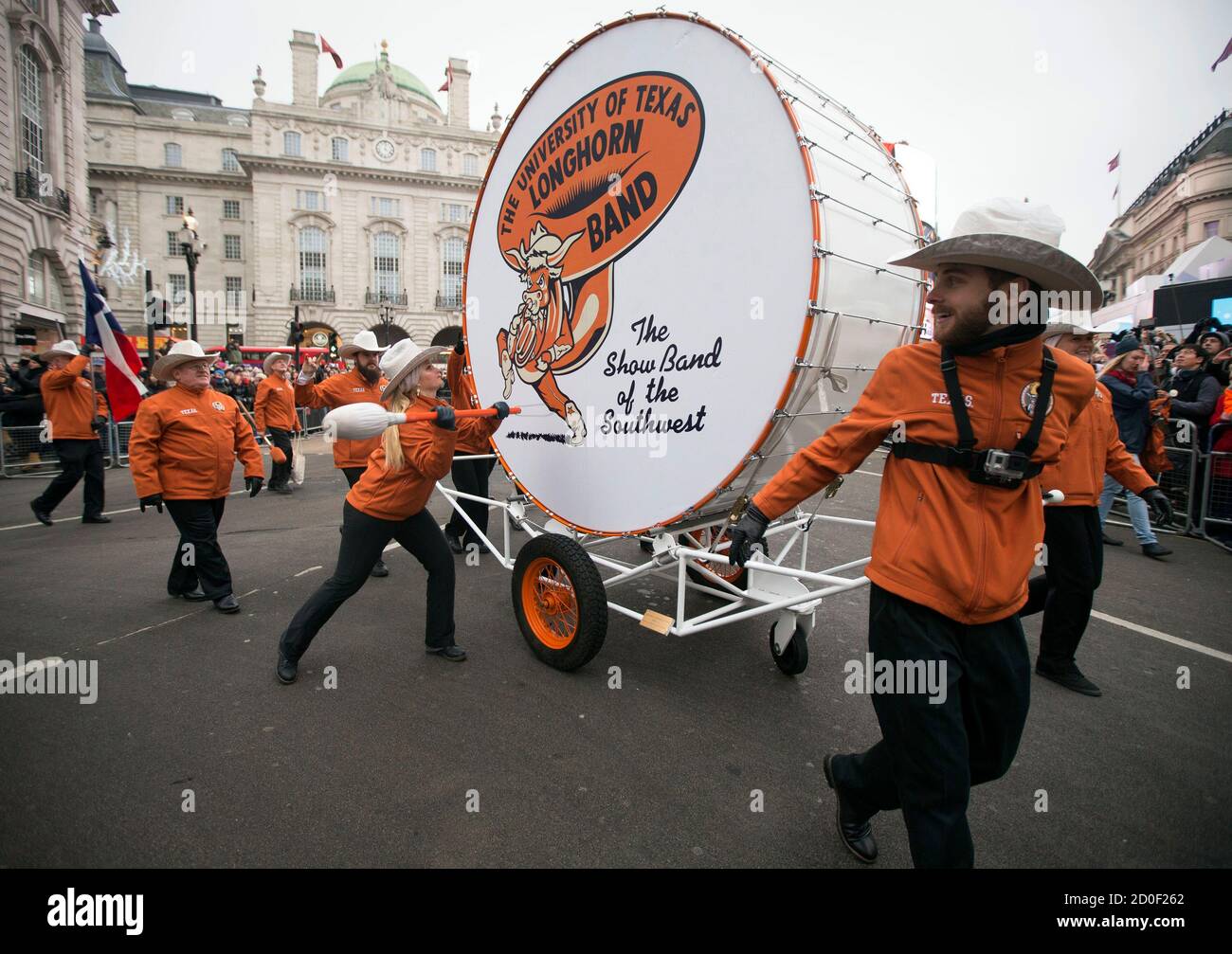 Members of The University of Texas Longhorn Alumni Band perform with their bass drum, dubbed 'Big Bertha', during the annual New Year's Day Parade in London January 1, 2015. REUTERS/Peter Nicholls (BRITAIN - Tags: SOCIETY ANNIVERSARY) Stock Photo