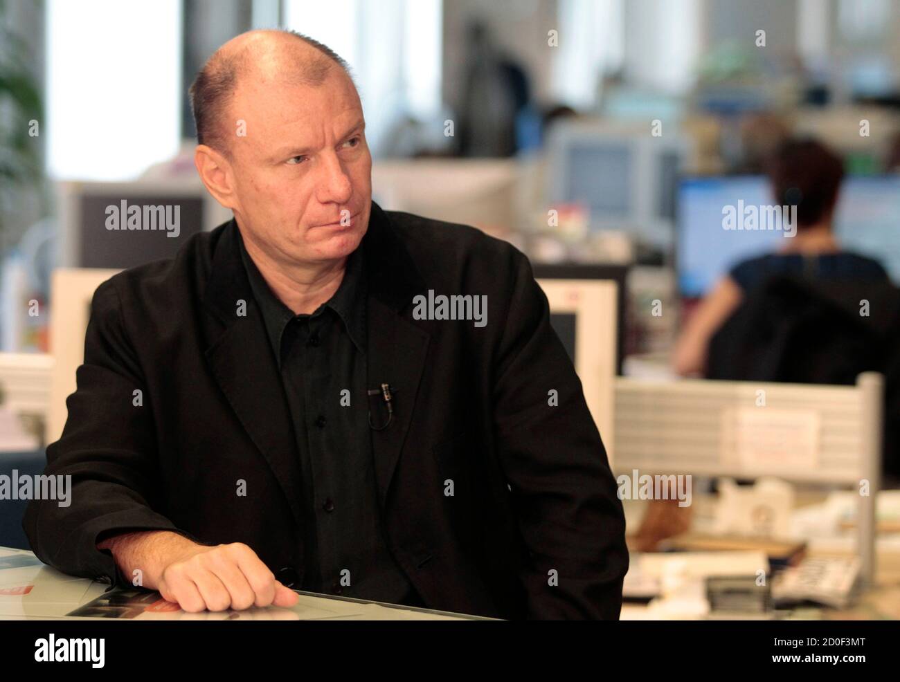 Vladimir Potanin, Founder and Owner of Interros, speaks with journalists at Reuters office in Moscow, September 15, 2010. Leading Russian business chiefs, bankers and officials will discuss the outlook for investment in Russia and progress on its modernisation at the fourth Reuters Russia Investment Summit from Sept. 13-15 in a series of exclusive interviews.  REUTERS/Alexander Natruskin  (RUSSIA) Stock Photo