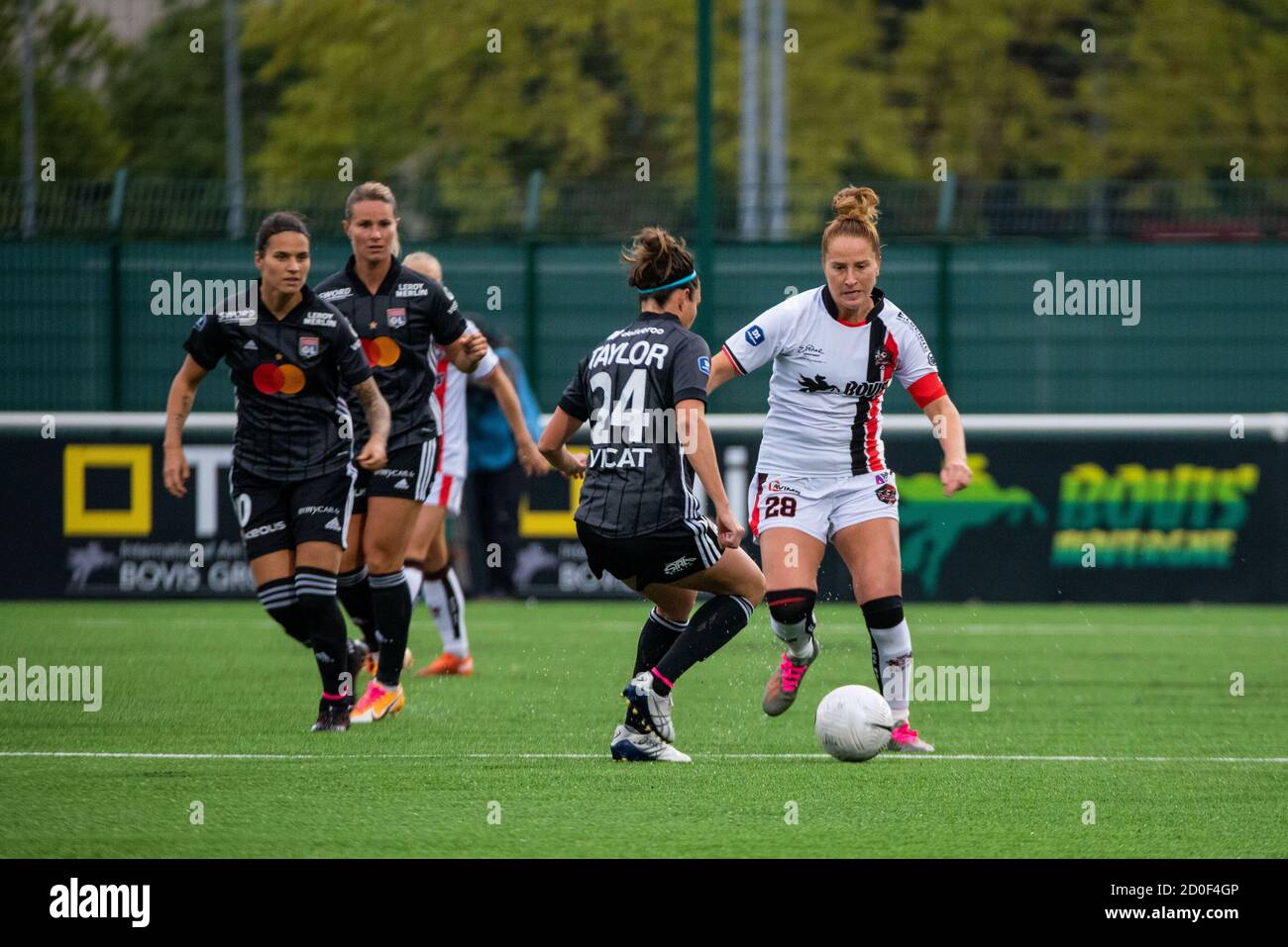 Jodie Taylor of Olympique Lyonnais and Marine Haupais of FC Fleury fight for the ball during the Women's French championship D1 Arkema football match Stock Photo