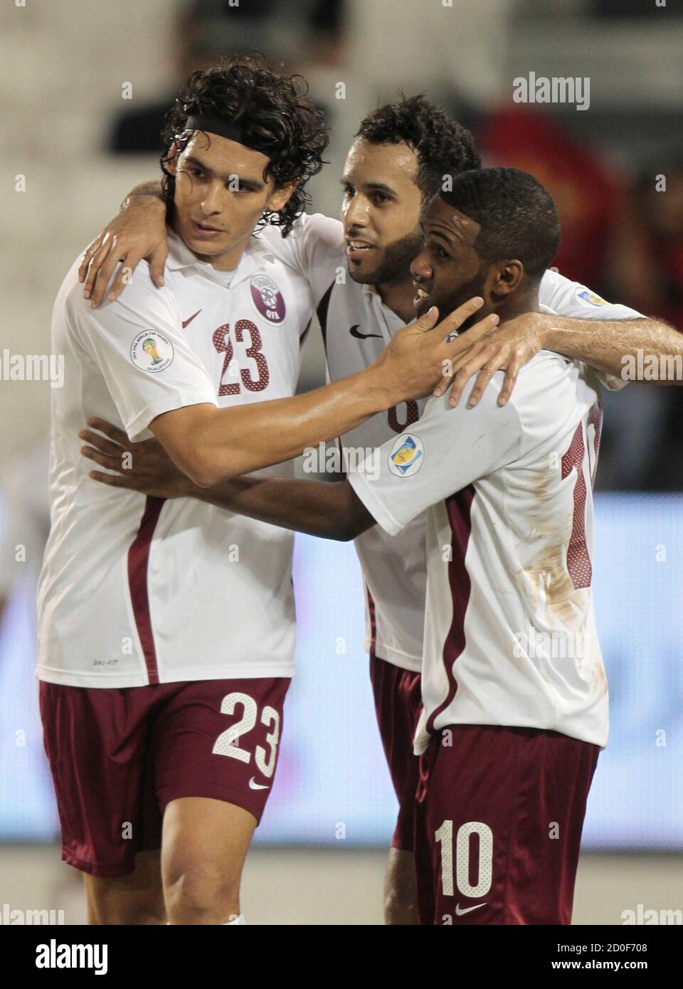 Qatar S Khalfan Ibrahim R Celebrates With Teammates Sebastian Soria L And Hussain Ali After Scoring Against Indonesia During Their Qualifying Match For The 14 World Cup In Doha November 11 11 Reuters Fadi