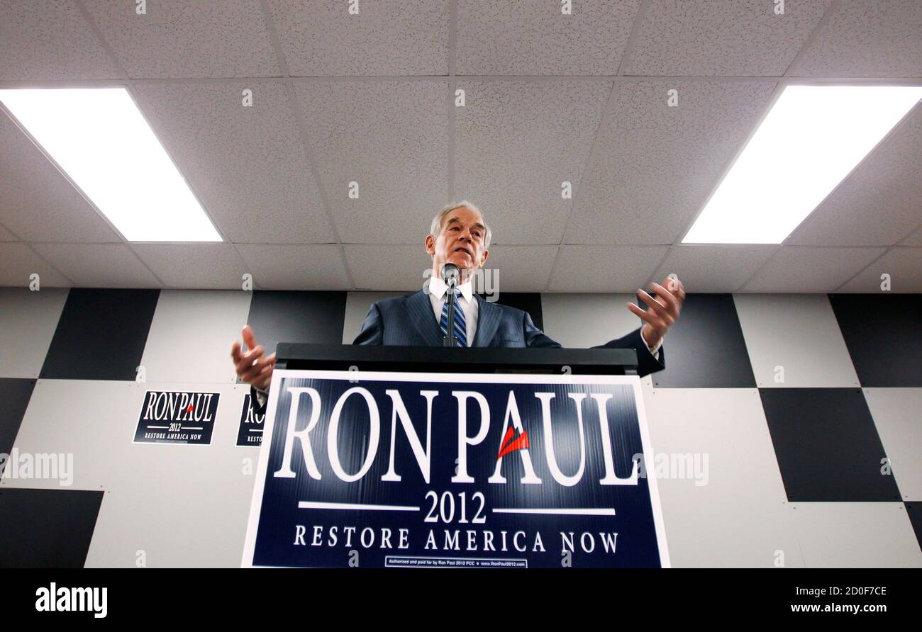 Republican presidential candidate Ron Paul speaks to supporters at a campaign stop at the Iowa Speedway in Newton, Iowa December 28, 2011. REUTERS/Jeff Haynes (UNITED STATES - Tags: POLITICS) Stock Photo
