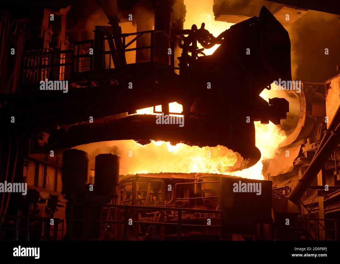 The top of a steel pan is pictured beside a furnace at the plant of
