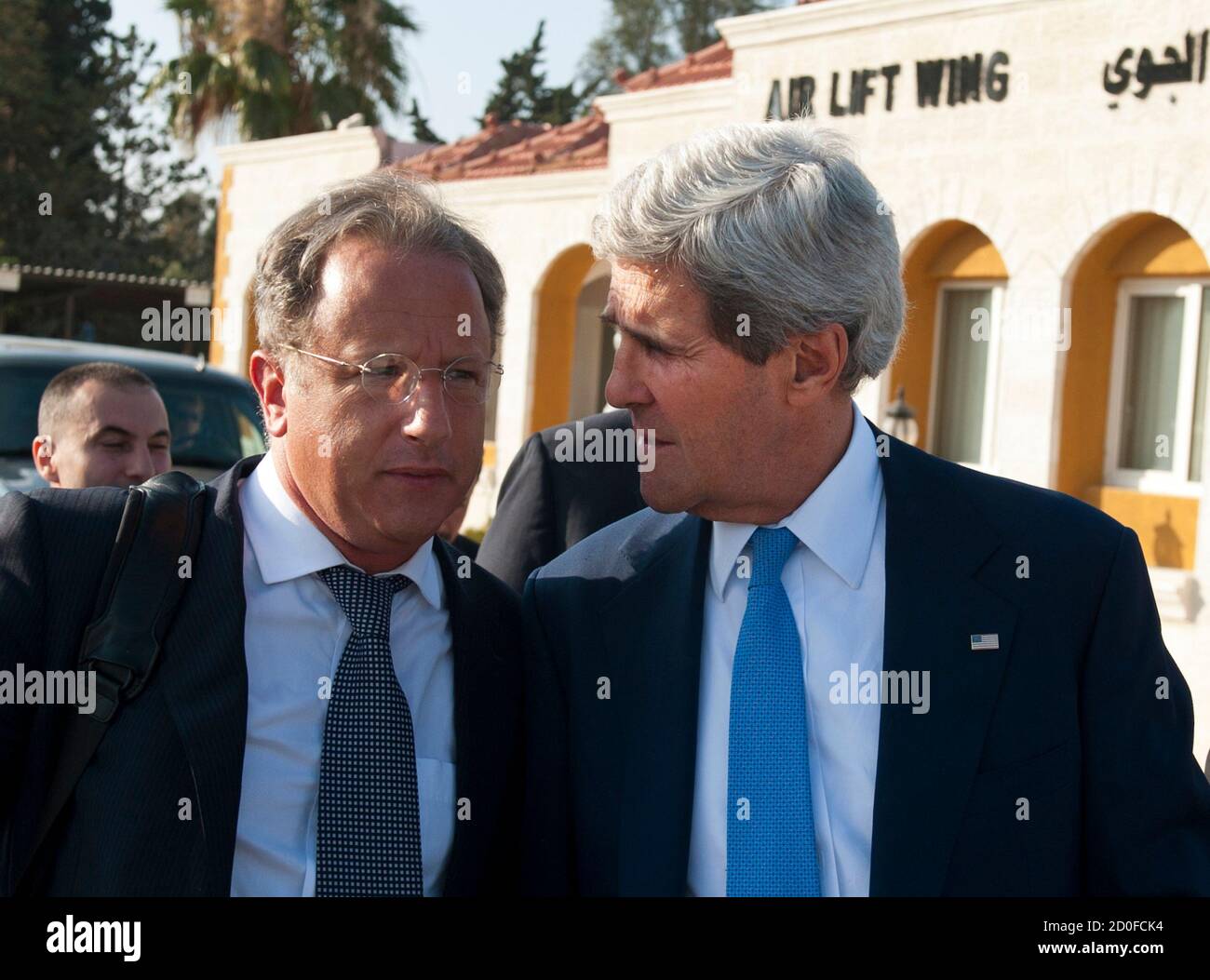 U S Secretary Of State John Kerry R Chats With Deputy Special Envoy For Middle East Peace Frank Lowenstein While Walking To Board A Flight In Amman July 19 2013 Israel And The