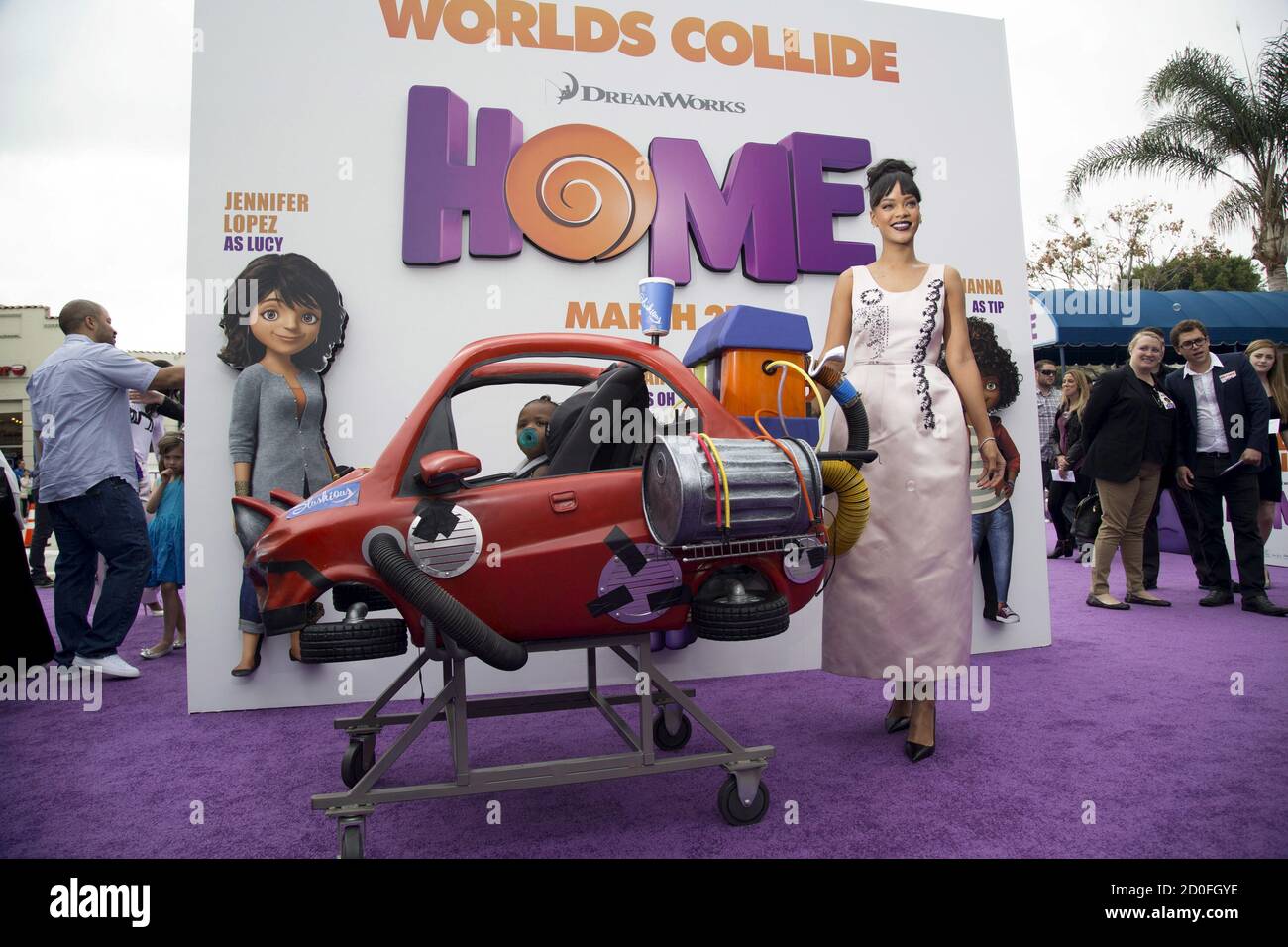 Cast Member Rihanna Who Is The Voice Of Gratuity Tip Tucci Pushes Her Niece Majesty At A Special Screening Of The Animated Movie Home In Los Angeles California March 22 15 The