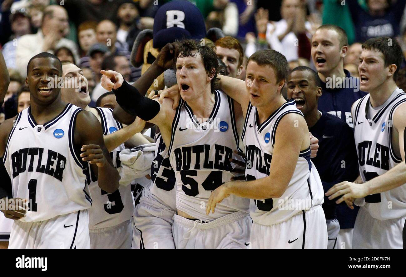 Butler University's Matt Howard (54) celebrates his game winning basket  over Old Dominion University during the second round NCAA men's basketball  championship game in Washington, March 17, 2011. REUTERS/Jim Young (UNITED  STATES -