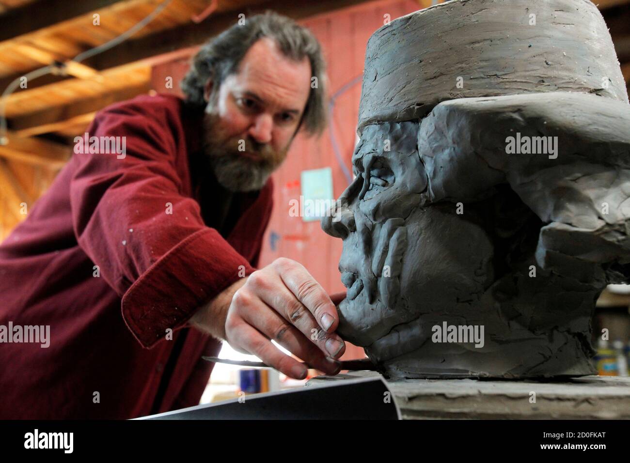 Artist Daniel Edwards Works On His Sculpture Knut Watches Over Germany Which Features Germany S Beloved Polar Bear Knut Sitting On Libyan Leader Muammar Gaddafi S Head At Edwards Studio In Moosup Connecticut March