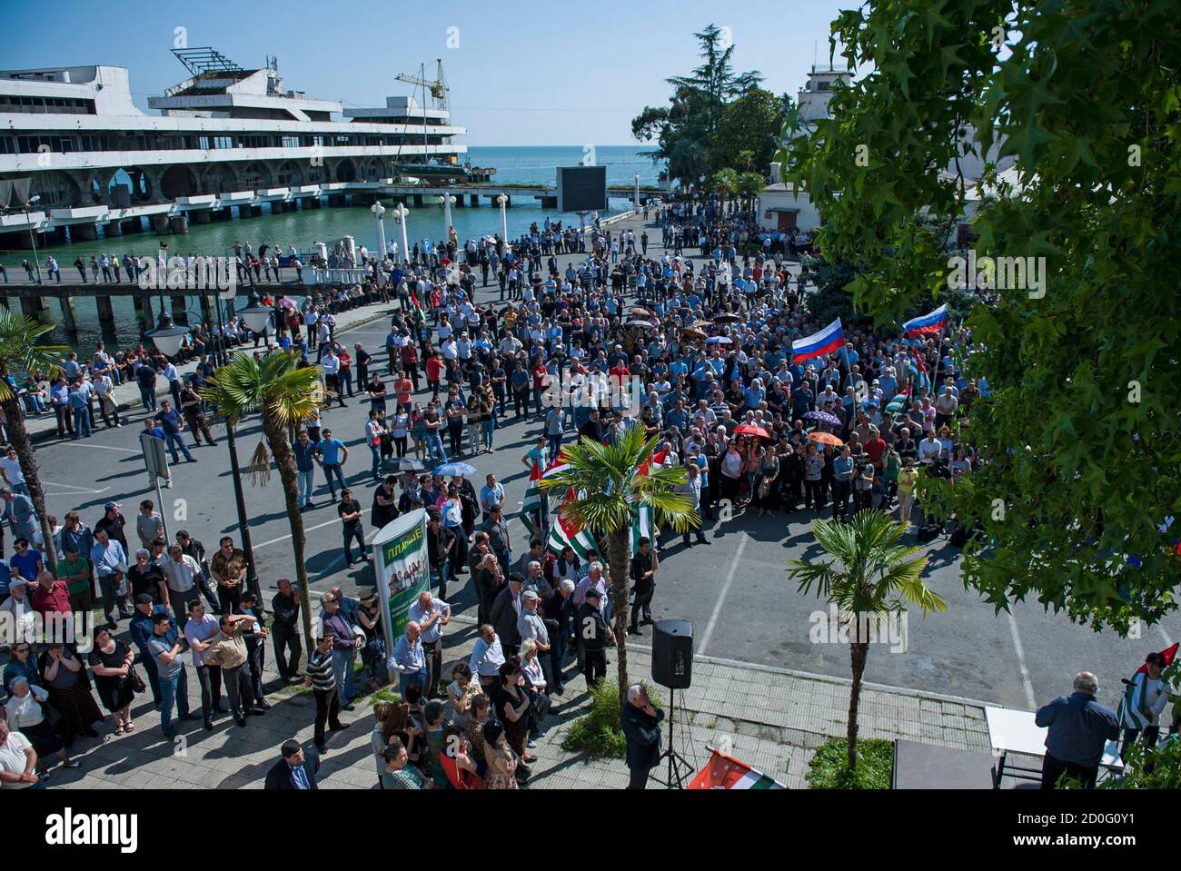Supporters of Abkhazia's President Alexander Ankvab hold a rally in Sukhumi, the capital of Georgia's breakaway region of Abkhazia May 28, 2014. Russia expressed concern on Wednesday over unrest in Abkhazia, where demonstrators have seized control of the presidential administration headquarters in what the leader of the Moscow-backed breakaway province of Georgia called an attempted coup. REUTERS/Nina Zotina (GEORGIA - Tags: POLITICS CIVIL UNREST) Stock Photo