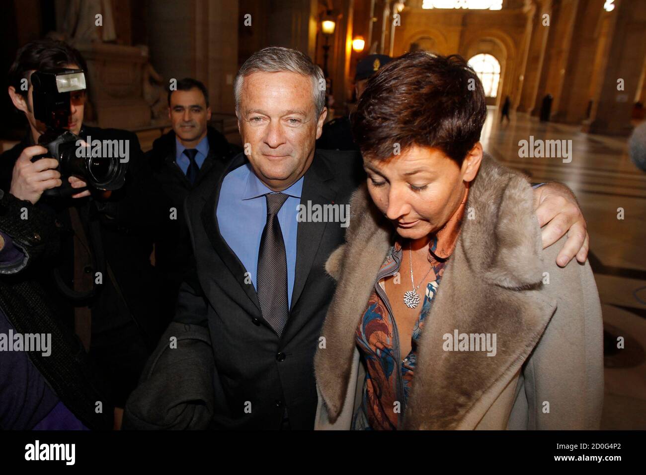 Former Vivendi head Jean-Marie Messier (L) and companion Christel Delaval  arrive at the Paris courts for the verdict in his trial January 21, 2011.  Messier, former CEO of media conglomerate Vivendi, is