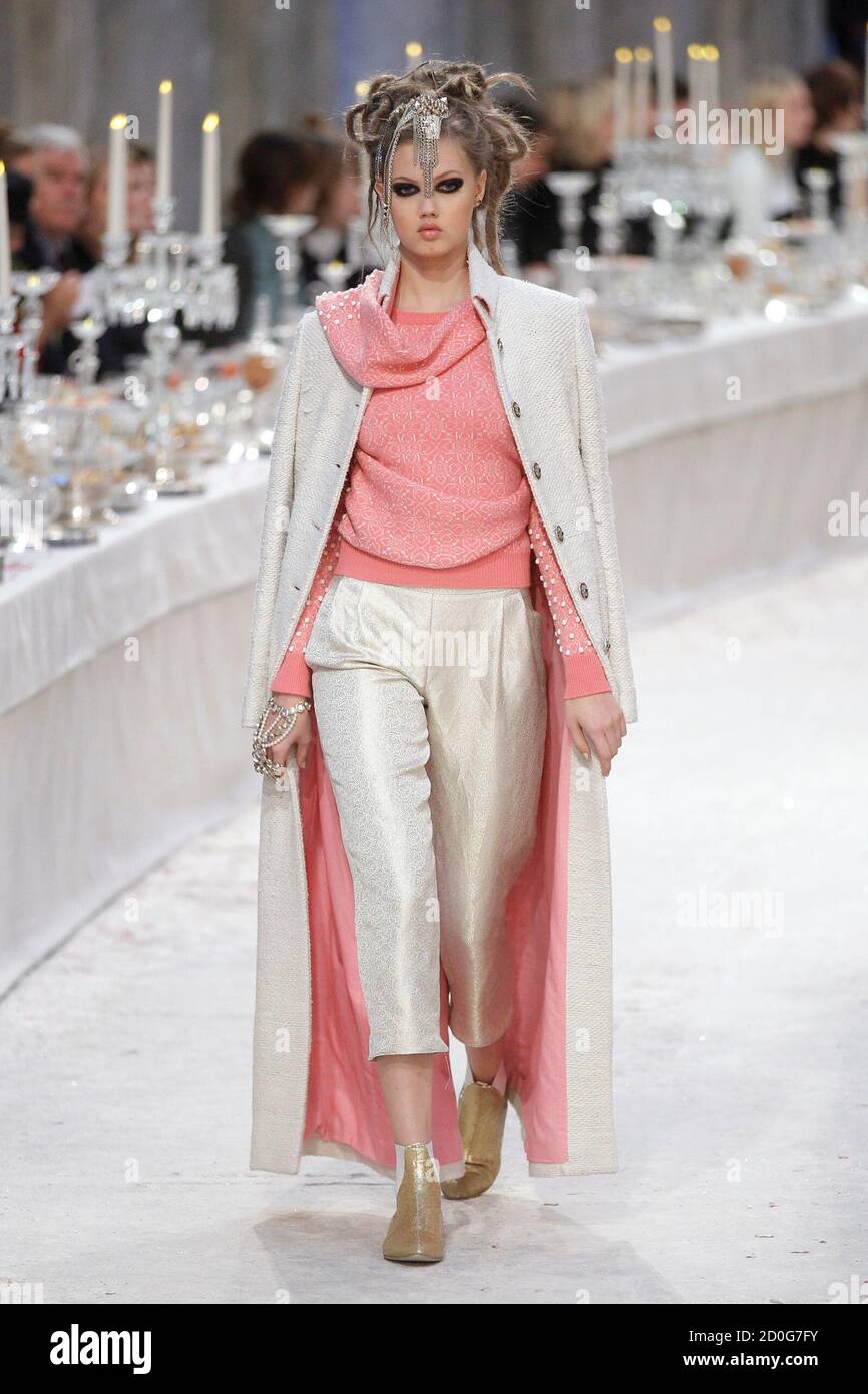 A model presents a creation with a Bombay-Paris theme by designer Karl  Lagerfeld during the Metiers D'Art Show for Chanel fashion house in Paris  December 6, 2011. The show, which exists since