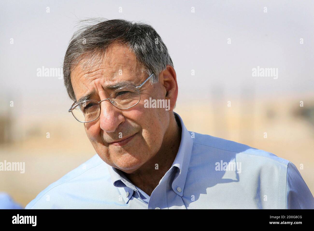 U.S. Defense Secretary Leon Panetta pauses for an interview after visiting with troops from the 31st BN Light Infantry of the Georgian Army at Forward Operating Base Shukvani, Afghanistan March 14, 2012. Panetta told troops in Afghanistan on Wednesday that the massacre of 16 Afghan civilians by an American soldier should not deter them from their mission to secure the country ahead of a 2014 NATO withdrawal deadline.  REUTERS/Scott Olson/Pool  (AFGHANISTAN - Tags: POLITICS MILITARY) Stock Photo