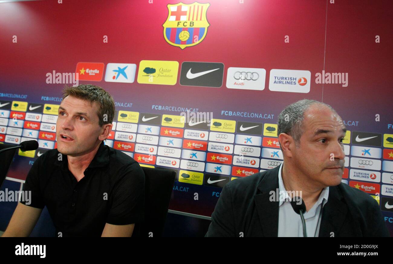 FC Barcelona's coach Tito Vilanova (L) and Sports Director Andoni Zubizarreta attend a news conference after the first training session of the season at Joan Gamper training camp, near Barcelona July 17, 2012. REUTERS/Albert Gea (SPAIN - Tags: SPORT SOCCER) Stock Photo