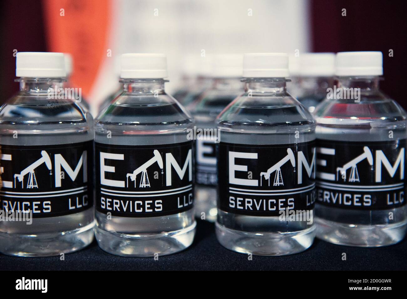 Bottles of water bearing the logo of an oilfield services company are given to jobseekers at a job fair in Williston, North Dakota March 11, 2015. REUTERS/Andrew Cullen    (UNITED STATES) Stock Photo