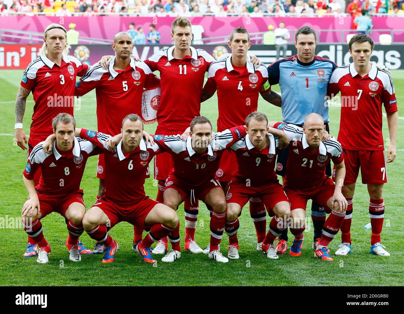 Denmark's players pose before the start of their Euro 2012 Group B soccer  match against Portugal at the new stadium in Lviv, June 13, 2012. Pictured  are back row: (L-R) Simon Kjaer,