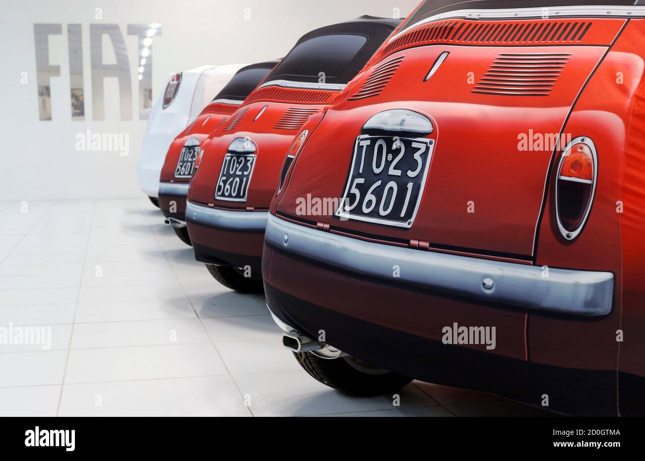 Fiat Cars Under Covers Are Seen At A Dealership In Rome October 30 2012 Fiat Downshifted Its Full Year Forecasts To The Lower End Of Its Range On Tuesday And Said Net Debt