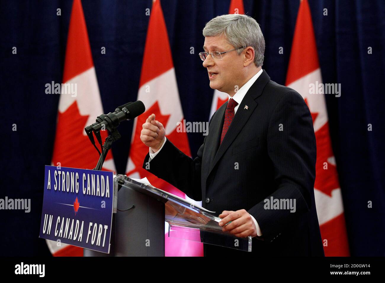Canada's Prime Minister Stephen Harper speaks during a news conference on Parliament Hill in Ottawa December 7, 2012. Harper voiced confidence on Friday that Canada would still attract the investment it needs despite new curbs he has imposed on state-owned enterprises seeking to acquire majority stakes in oil sands businesses.  REUTERS/Chris Wattie (CANADA - Tags: POLITICS BUSINESS) Stock Photo