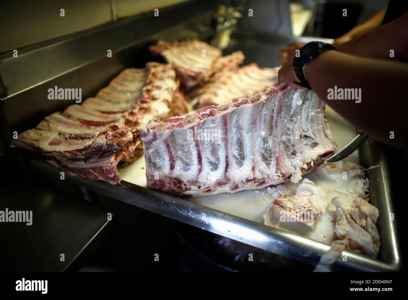 A Man Chops Beef Ribs At The Outdoor Grill In Culver City Los Angeles California April 10 2014 Retail Beef And Pork Prices Reached All Time Highs Last Month According To Bill Hahn Tweak the beef, hsu's departure. alamy