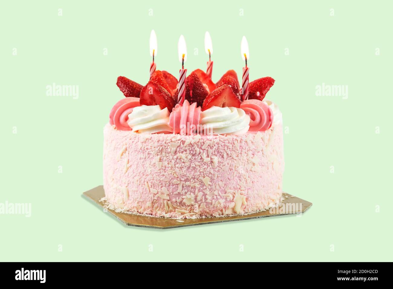 Close up of a birthday cake with candles on a pastel color background ...