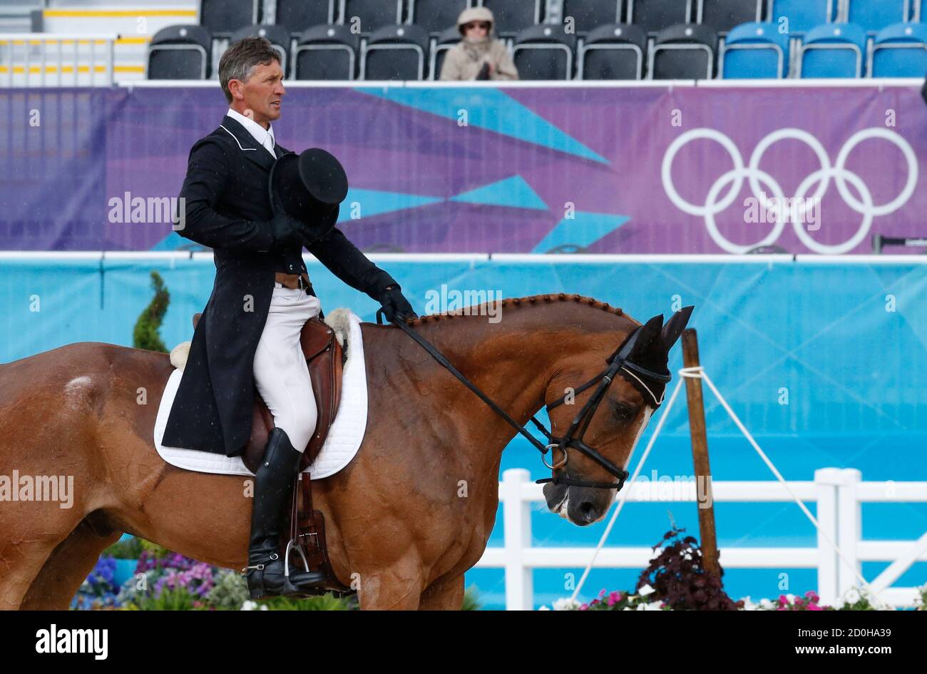 Andrew Nicholson of New Zealand riding Nereo gestures during the equestrian Eventing Individual Dressage Day 2 in the Greenwich Park during the London 2012 Olympic Games, July 29, 2012.              REUTERS/Mike Hutchings (BRITAIN  - Tags: SPORT EQUESTRIANISM OLYMPICS) Stock Photo