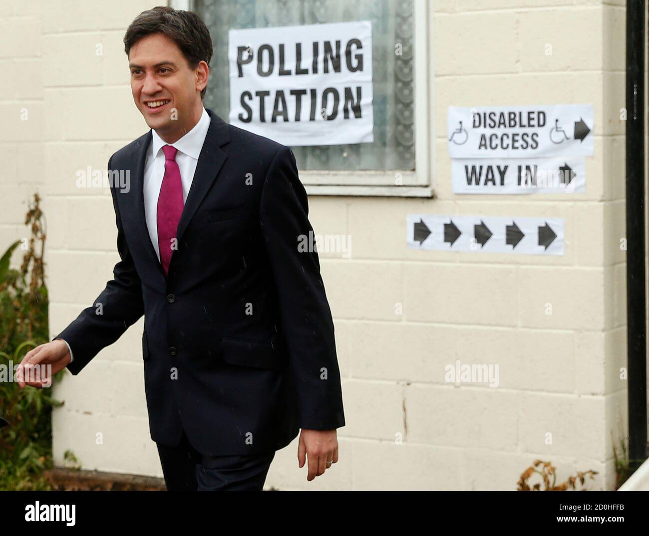 Britain's leader of the opposition Labour Party, Ed Miliband smiles after voting in the local council and European elections at a polling station in the village of Sutton, near Doncaster in northern England May 22, 2014. REUTERS/Phil Noble (BRITAIN - Tags: POLITICS ELECTIONS) Stock Photo