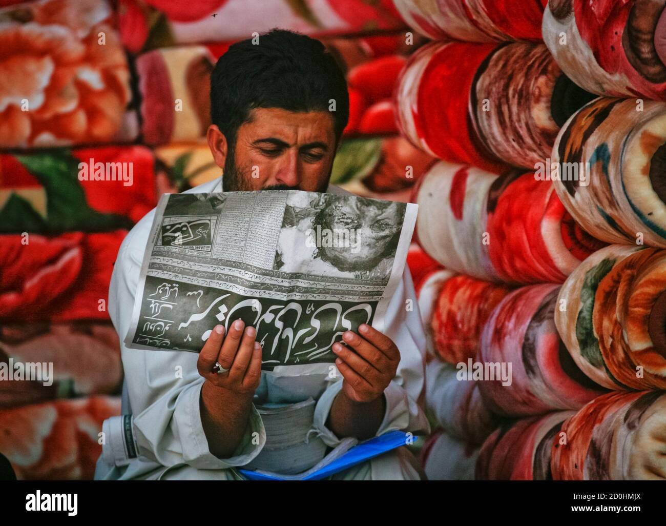 A Man Selling Carpets Reads A Local Newspaper Reporting The Death Of Al Qaeda Leader Osama Bin Laden In Quetta May 2 11 Bin Laden Was Killed In A U S Helicopter Raid On