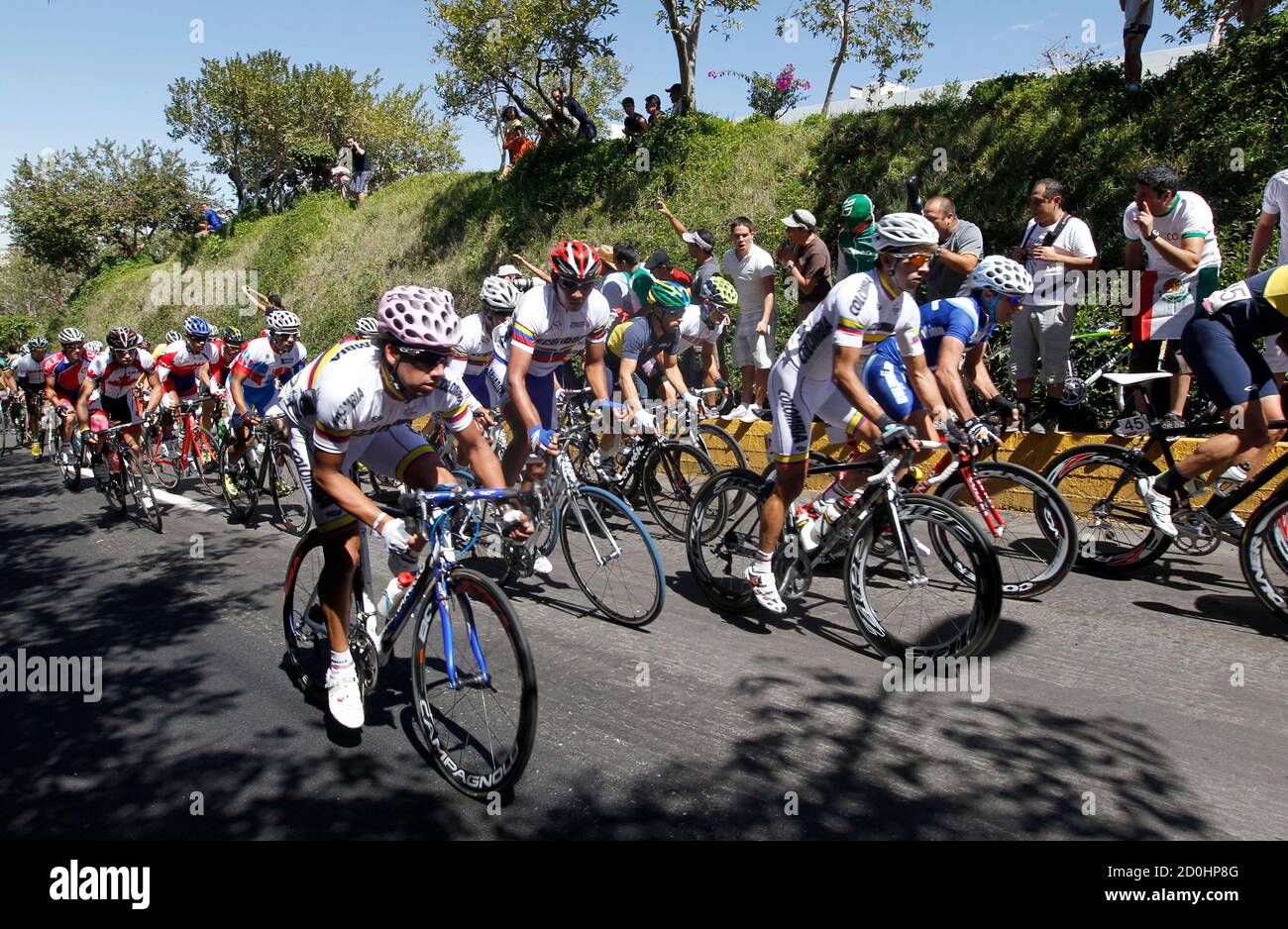 Cyclists compete in the men's road race cycling competition at the Pan American Games in Guadalajara, October 22, 2011.   REUTERS/Jose Miguel Gomez    (MEXICO - Tags: SPORT CYCLING) Stock Photo