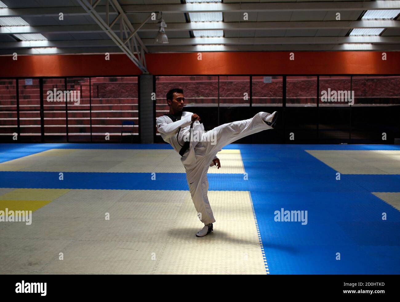 Mexican Taekwondo Fighter And Olympic Hopeful Erick Osornio Practices His Kick During A Training Session At The Mexican Olympic Committee Facilities Com In Mexico City April 19 2012 With Success In The