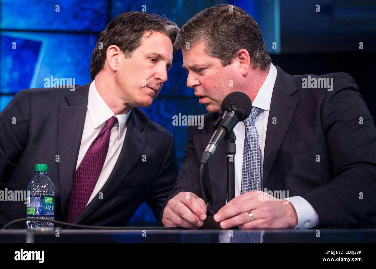 Toronto Maple Leafs General Manager Dave Nonis (R) speaks to the  newly-introduced Toronto Maple Leafs President Brendan Shanahan at a news  conference in Toronto, April 14, 2014. REUTERS/Mark Blinch (CANADA - Tags: