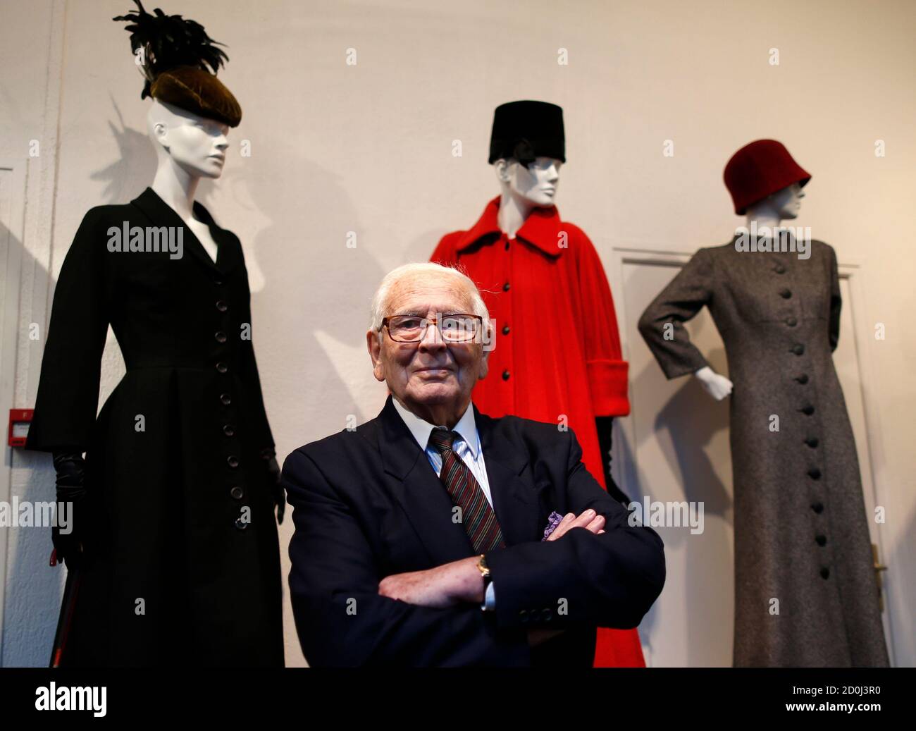 French fashion designer Pierre Cardin poses in front of his 1951-1952 first  fashion creations in his museum called "Past-Present-Future" in Paris  November 12, 2014. The museum will open on November 13 and