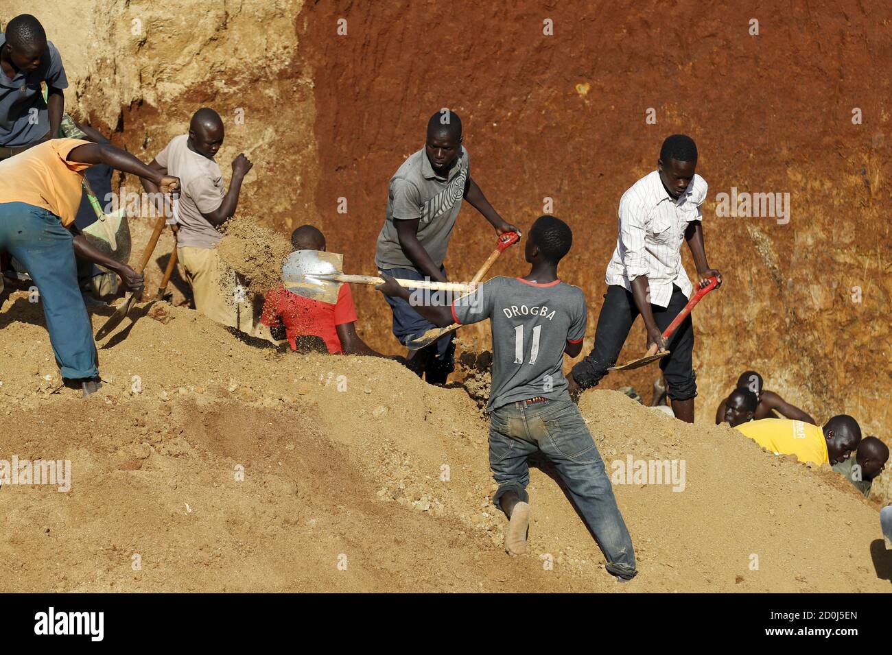 Gold prospectors work at an open-pit in the U.S. President Barack Obama's ancestral village of Nyang'oma Kogelo, west of Kenya's capital Nairobi, July 15, 2015. President Obama visits Kenya and Ethiopia in July, his third major trip to Sub-Saharan Africa after travelling to Ghana in 2009 and to Tanzania, Senegal and South Africa in 2011. He has also visited Egypt, in North Africa, and South Africa for Nelson Mandela's funeral. Obama will be welcomed by a continent that had expected closer attention from a man they claim as their son, a sentiment felt acutely in the Kenyan village where the 44t Stock Photo