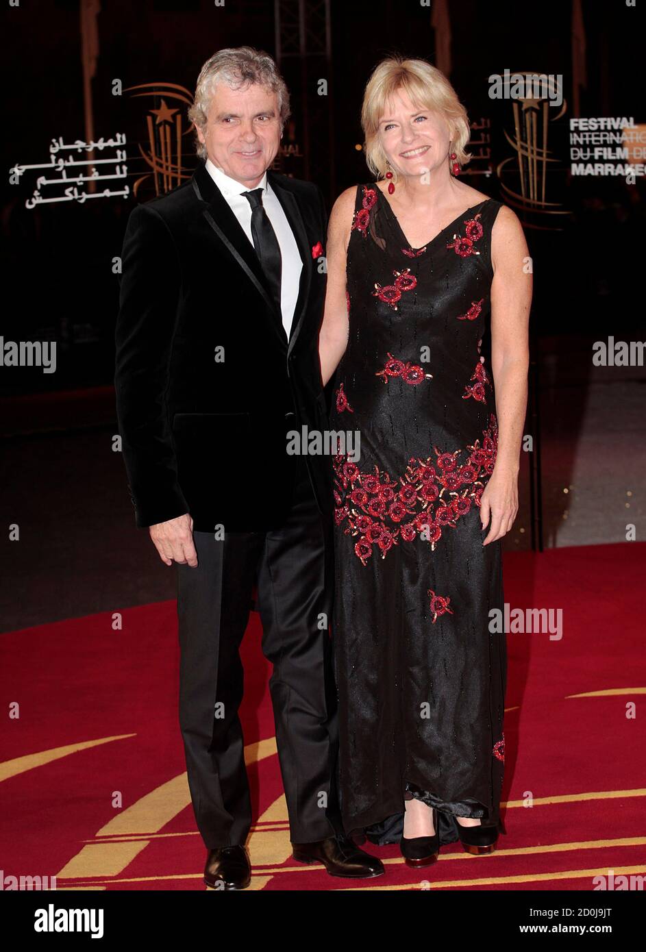 French television journalist Claude Serillon and his wife arrive at the  11th International Marrakech Film Festival (FIFM), December 8, 2011.  REUTERS/Jean Blondin (MOROCCO - Tags: ENTERTAINMENT MEDIA Stock Photo -  Alamy