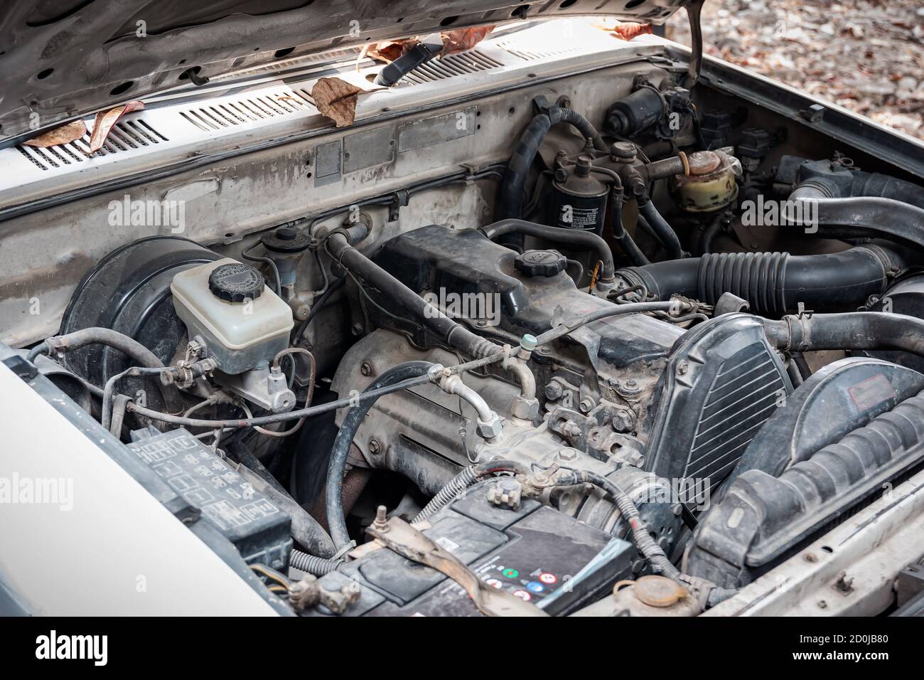 Closeup of the old engine of the car that is parked in the garage to ...
