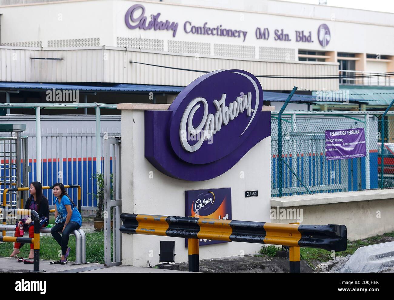 Women Sit Outside The Cadbury Factory In Shah Alam Outside Kuala Lumpur June 11 14 The Storm Of Bad Publicity That Hit Confectioner Cadbury In Malaysia After Its Chocolates Tested Positive For