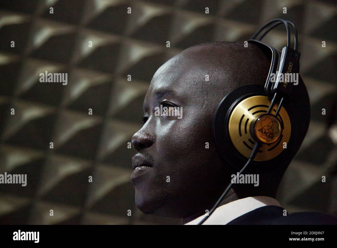 Mading Ngor broadcasts his morning radio program "Wake up Juba" from the  studio of Bakhita Radio in Juba May 28, 2012. In South Sudan, where most  people get their news not from