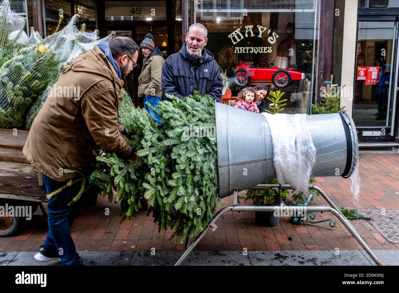 A Local Man Buying A Christmas Tree, High Street, Lewes, East Sussex