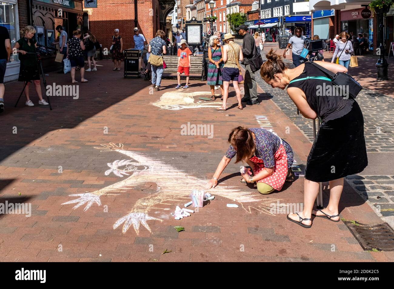 Climate Change Activists Drawing Pictures On The Pavement (Sidewalk), Lewes, East Sussex, UK. Stock Photo