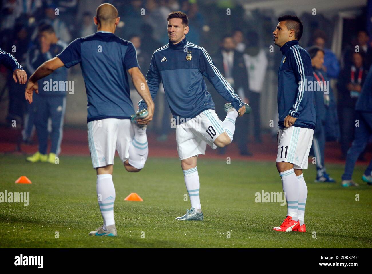 Argentina S Javier Mascherano L And Lionel Messi Stretch As Sergio Aguero Looks On Before Their Copa America 15 Semi Final Soccer Match Against Paraguay At Estadio Municipal Alcaldesa Ester Roa Rebolledo In Concepcion Argentina S Javier Mascherano L And Lionel Messi Stretch As Sergio Aguero Looks On Before Their Copa America 15 Semi Final Soccer Match Against Paraguay At Estadio Municipal Alcaldesa Ester Roa Rebolledo In Concepcion