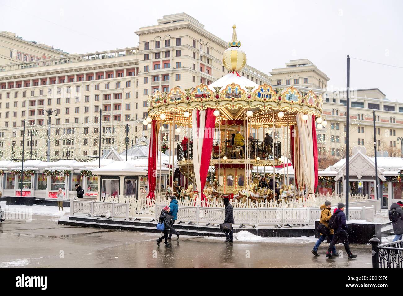 Moscow, Russia - December 20, 2018: colorful merry go round on christmass and new year holidays. Festive Manezhnaya Square and christms fair Stock Photo