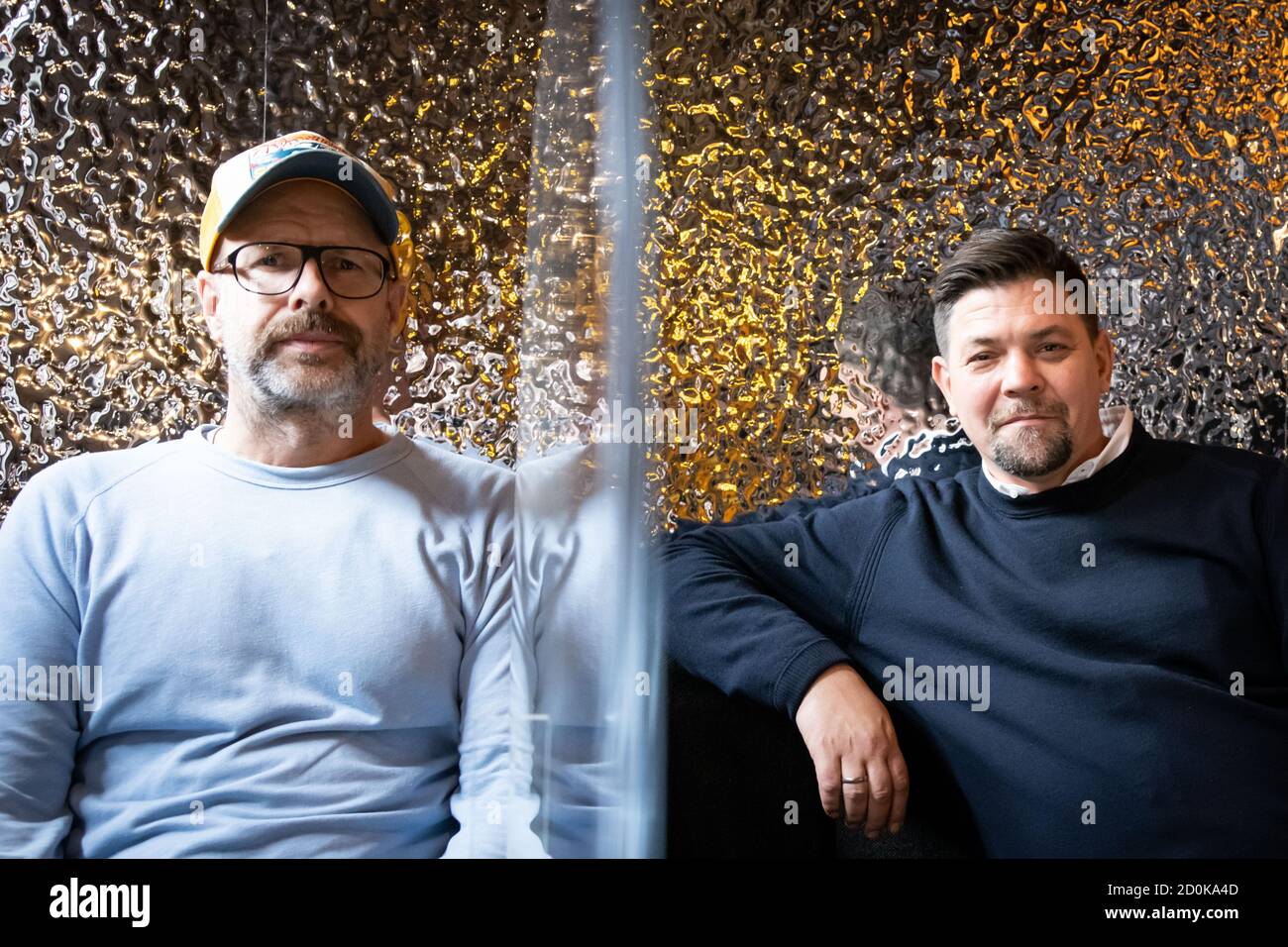 Hamburg, Germany. 02nd Oct, 2020. TV chef Tim Mälzer (r) and Patrick Rüther, restaurateur and business partner, sit in the newly designed rooms of his restaurant 'Bullerei'. Mälzer and his business partner Rüther reopened on 03.10.2020 after a six-month compulsory break. Credit: Christian Charisius/dpa/Alamy Live News Stock Photo