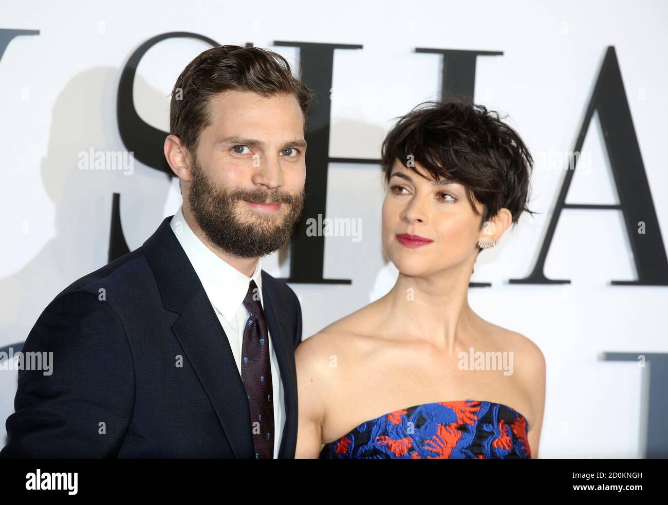 Cast member Jamie Dornan and his wife Amelia Warner arrive for the British  premiere of the movie 'Fifty Shades of Grey' in London February 12, 2015.  REUTERS/Paul Hackett (BRITAIN - Tags: ENTERTAINMENT