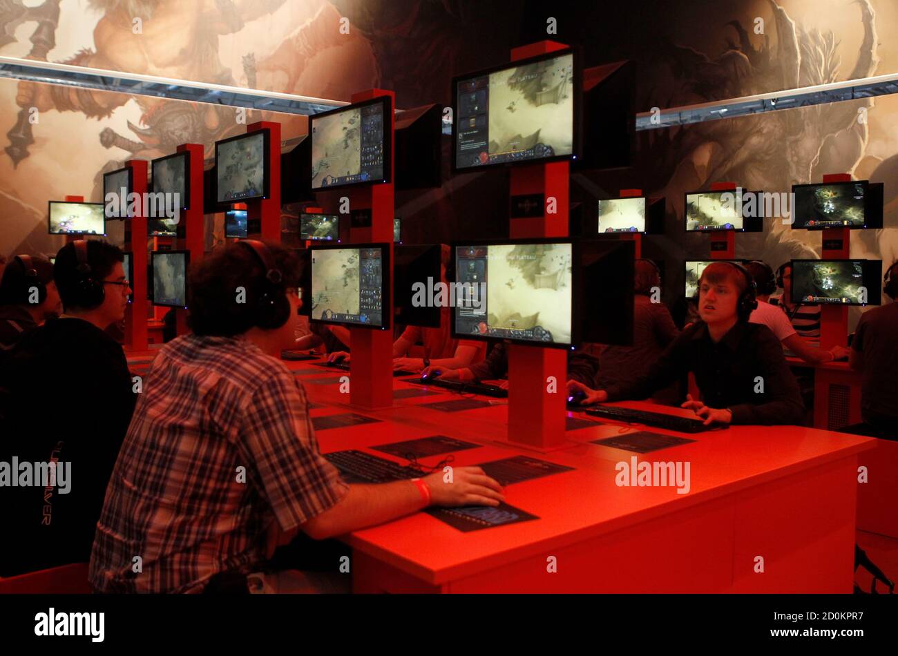Visitors Play Blizzard Entertainment Diablo At Their Exhibition Stand At The Gamescom 10 Fair In Cologne