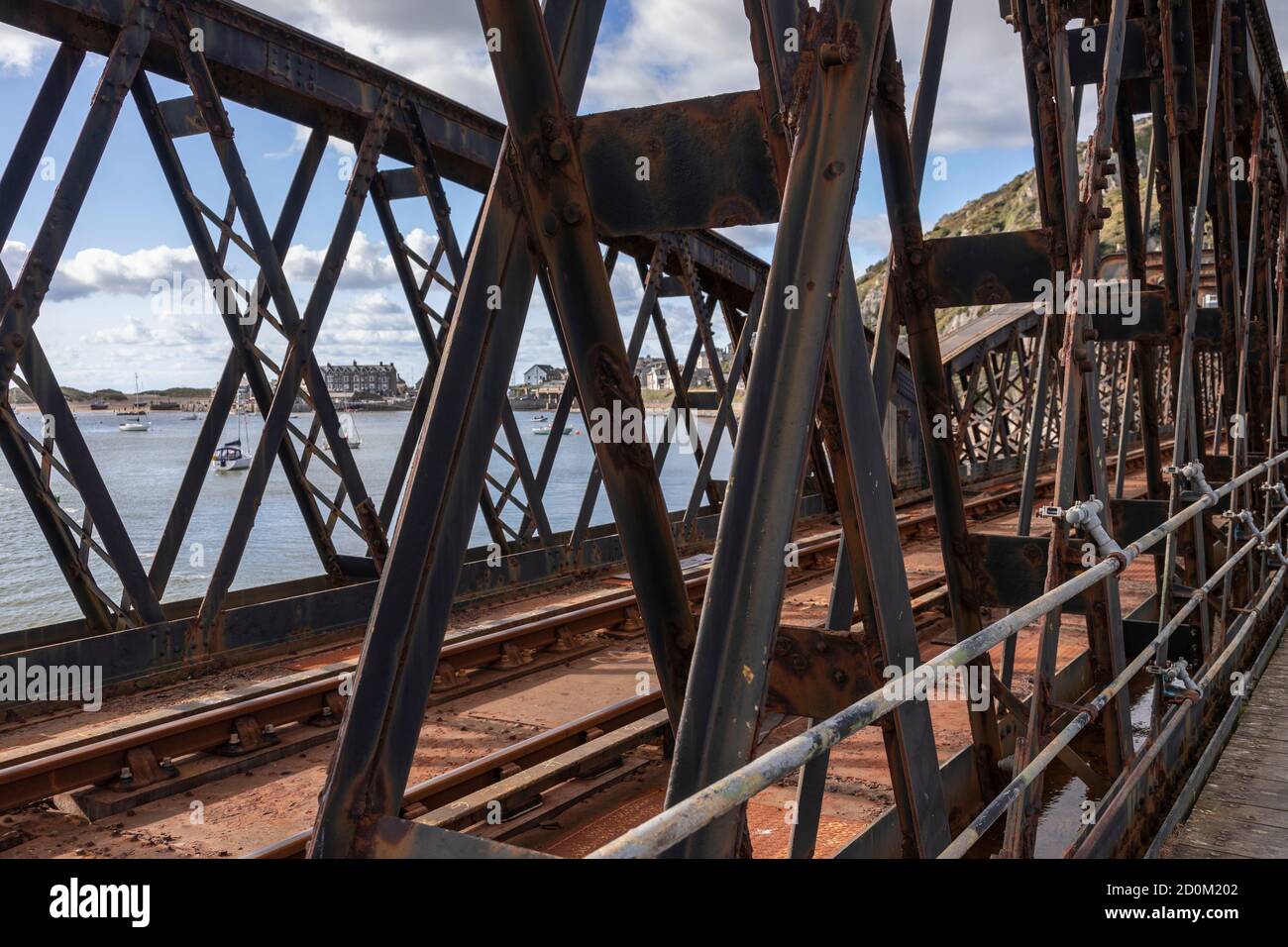 Barmouth railway bridge over the Mawddach estuary on the Wales coast Stock Photo