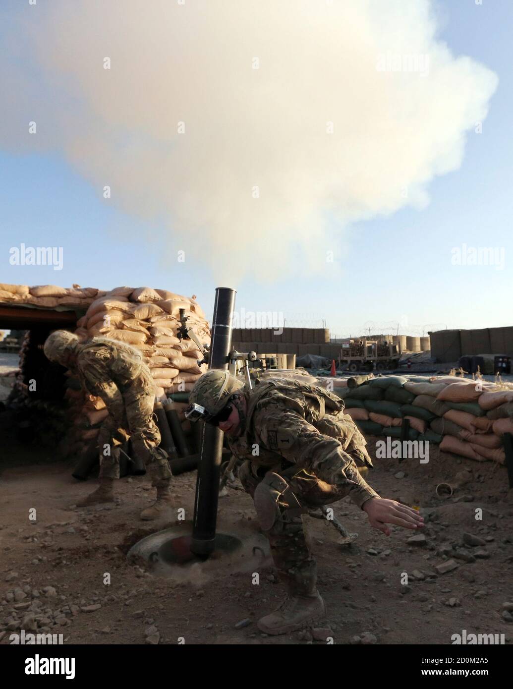 U S Soldiers Of B Troop 1st Squadron Of 4th Us Cavalry Regiment Fire A 120 Mm Mortar Shell During A Mortar Registration Exercise At Cop Combat Outpost Sar Howza In Paktika Province