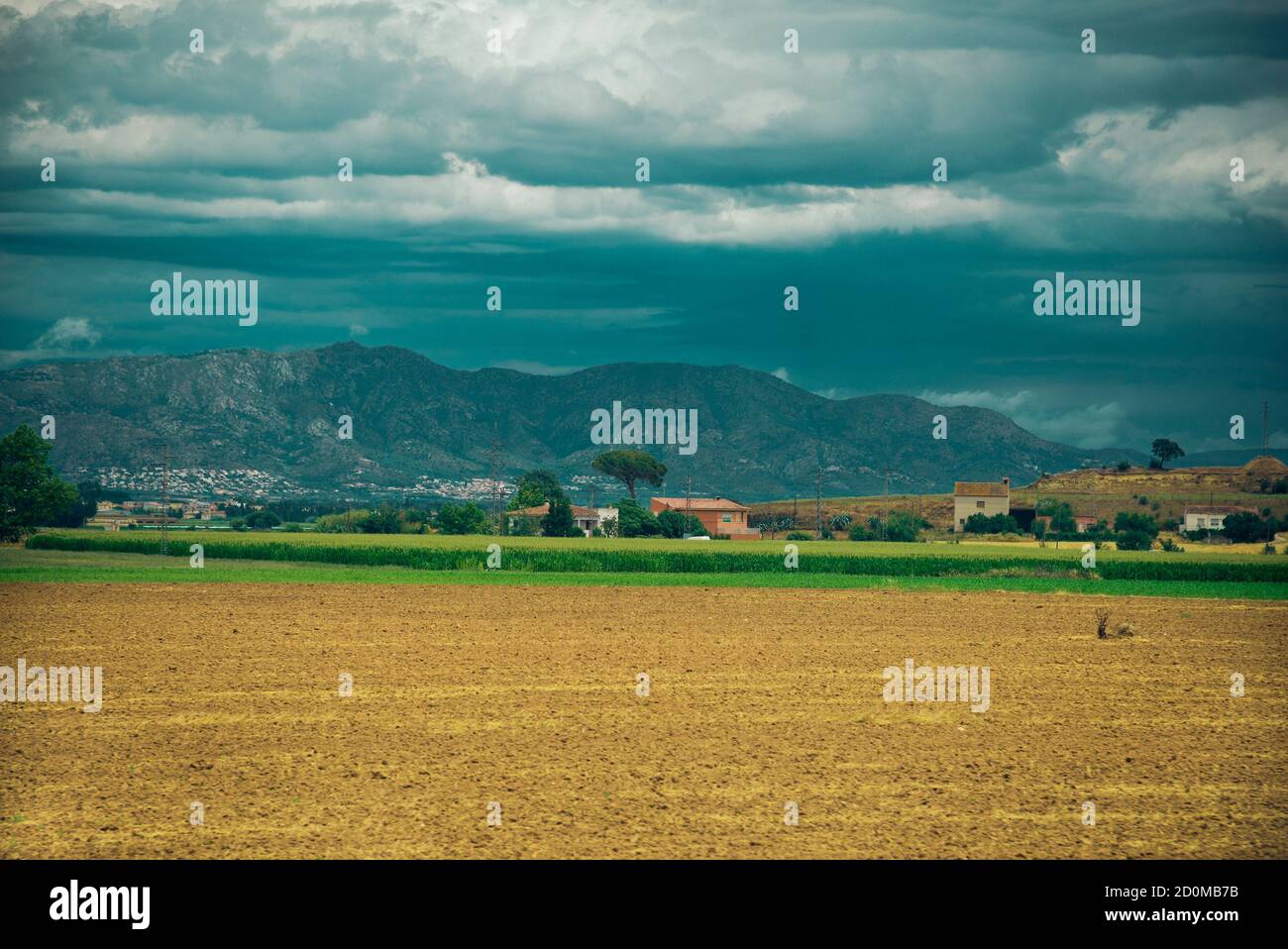 Landscape with field and houses in Spain Stock Photo - Alamy