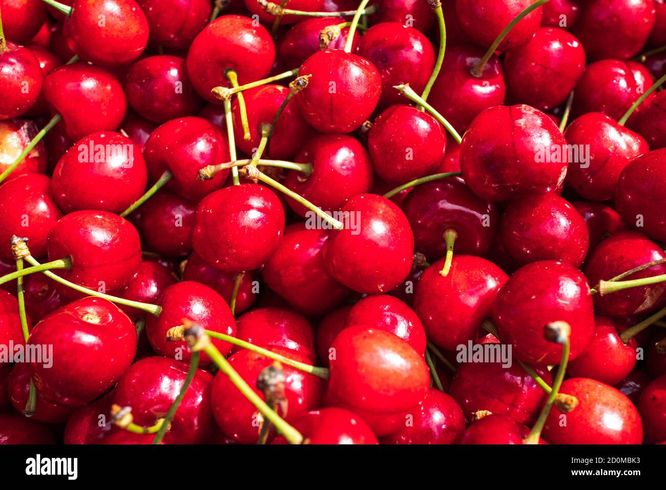 Fresh red cherries on a fruit market Stock Photo Alamy