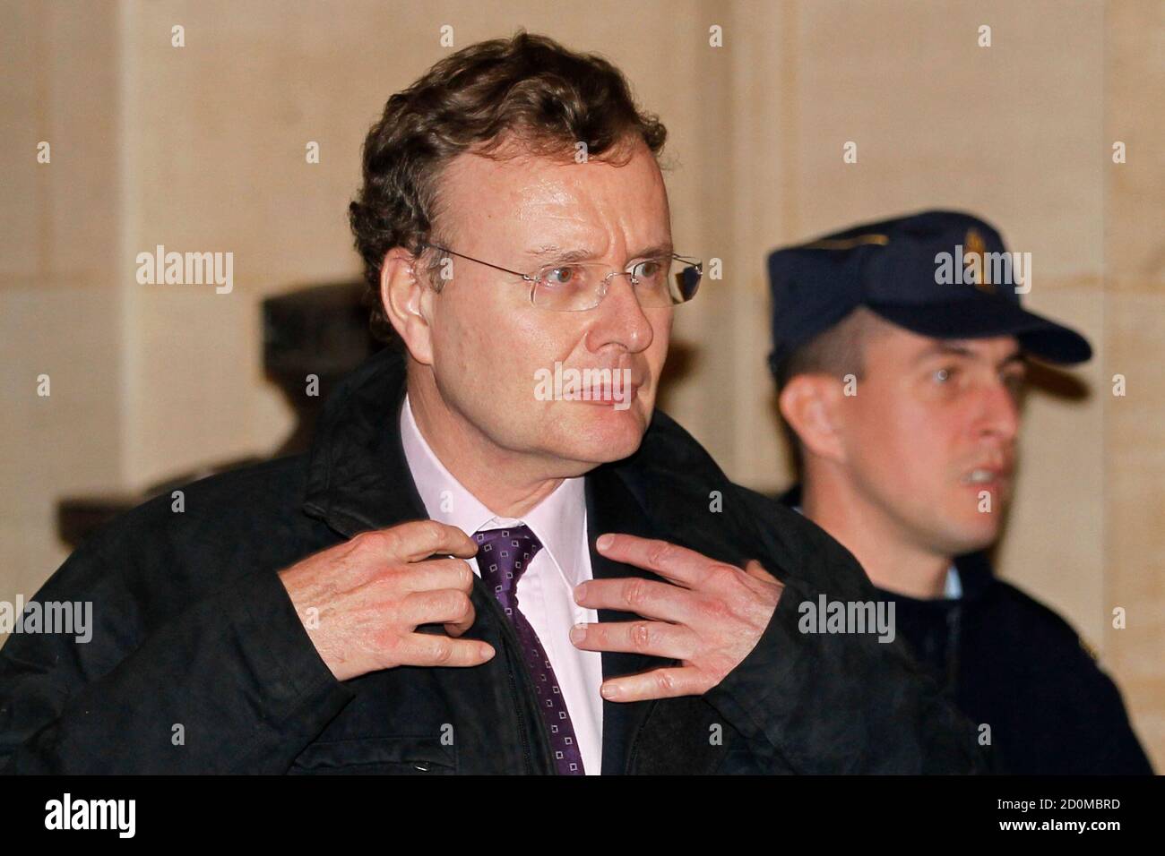 Jean de Gaulle, grandson of the late French President General Charles de  Gaulle, leaves after the first day of a trial of wrongful use of public  funds March 7, 2011. Former French