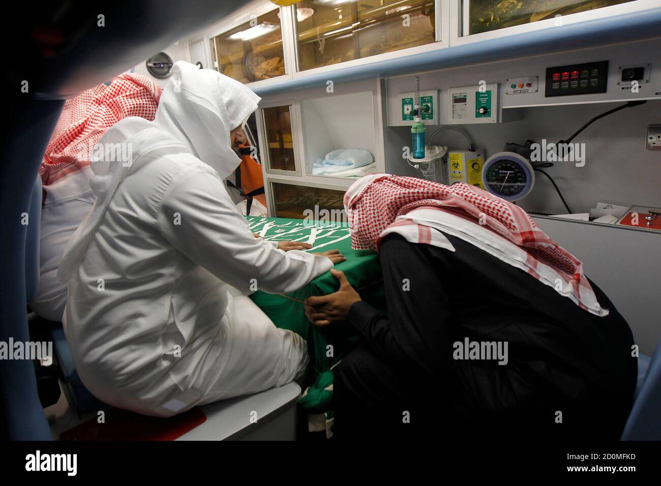 Relatives Of Khalaf Al Ali A Second Secretary At The Saudi Arabian Embassy In Bangladesh Ride With His Coffin In An Ambulance As They Arrive At Riyadh Airport Early March 9 12