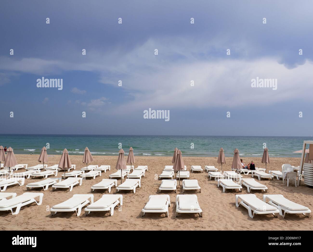 Bathing establishments on the beach on a cloudy day in the end of the season Stock Photo